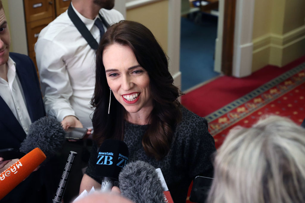 Prime Minister Jacinda Ardern talks to reporters at Parliament in Wellington. Photo: Getty