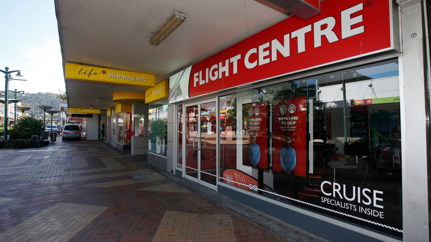 Flight Centre has closed more than half its stores around the country. Photo: Michael Cunningham ...