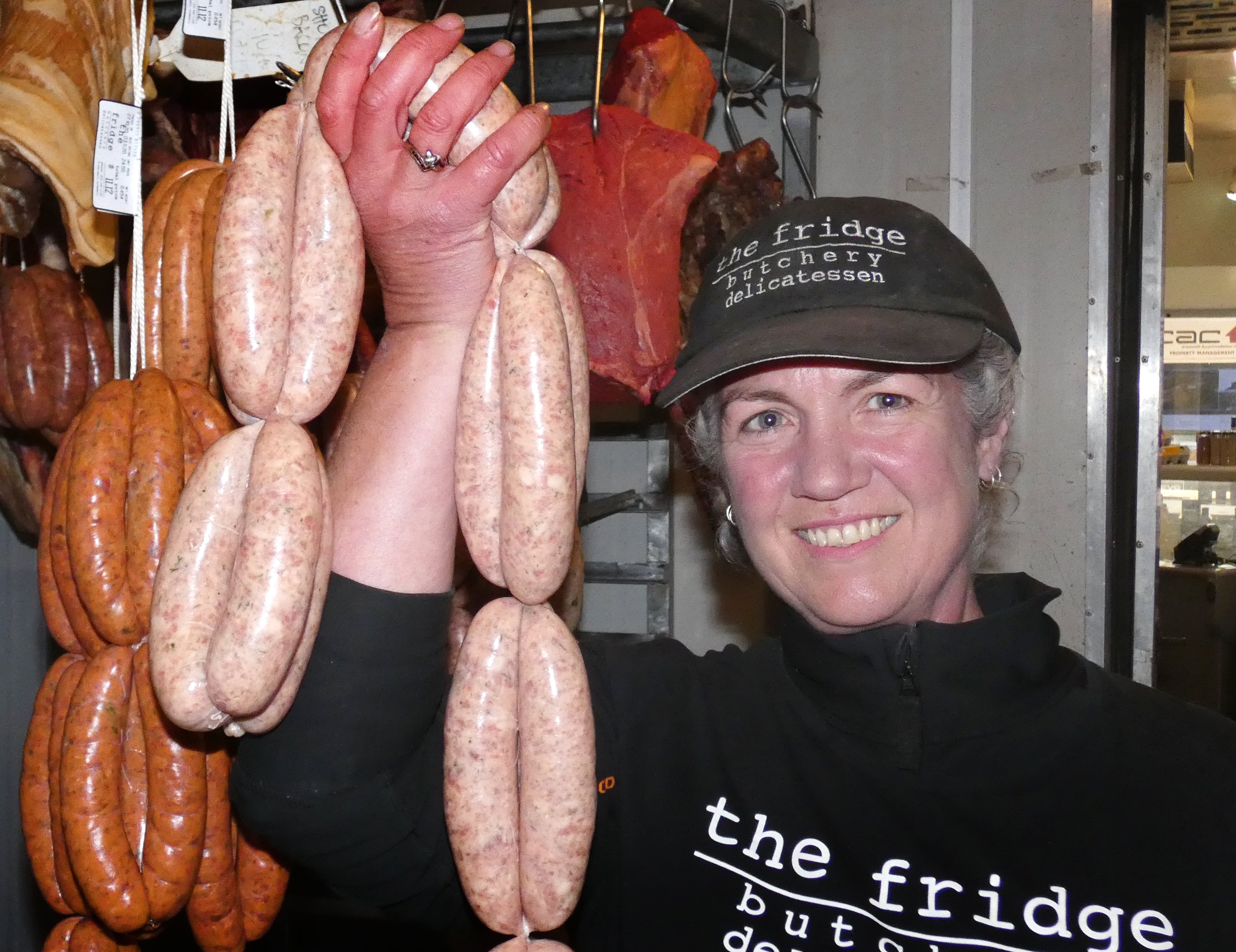 Holding her gold medal-winning pork and fennel sausage is The Fridge butchery and delicatessen...