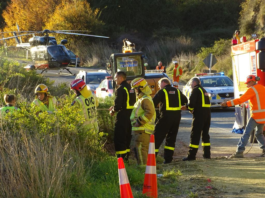 Emergency services at the crash scene at the time of the crash. Photo: Tracey Roxburgh