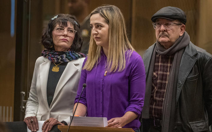 Aya Al-Umari with her parents at the gunman's sentencing earlier this year. Photo: Stuff / Pool