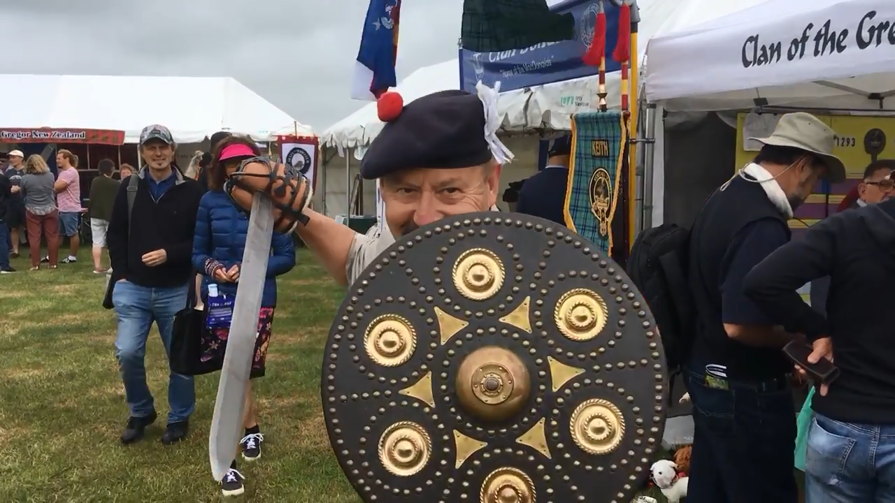 Clan Keith convener Ian Dickson demonstrates a couple of 18th century swords and a shield at the...