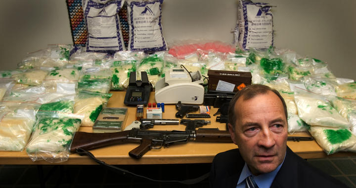 Detective Inspector Bruce Good with $95 million worth of methamphetamine which was intercepted as...