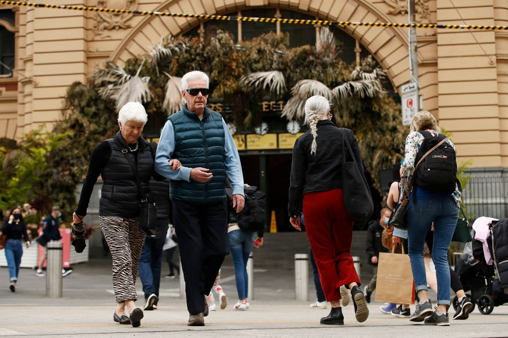 People walk without masks in central Melbourne. Photo: Getty