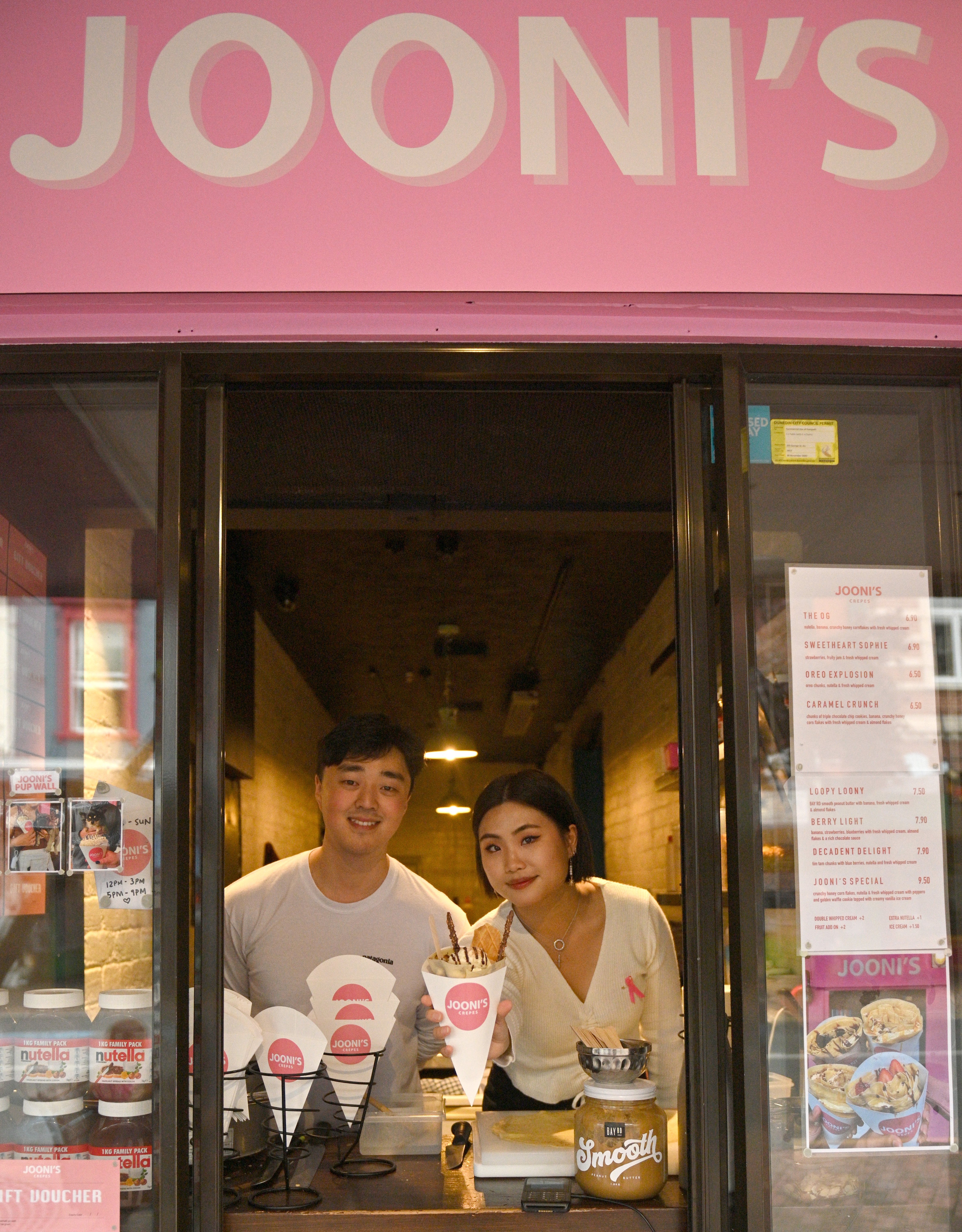 Nikko Kim and Joo Kim at their Jooni’s Crepes window in George St yesterday. PHOTO: GREGOR...