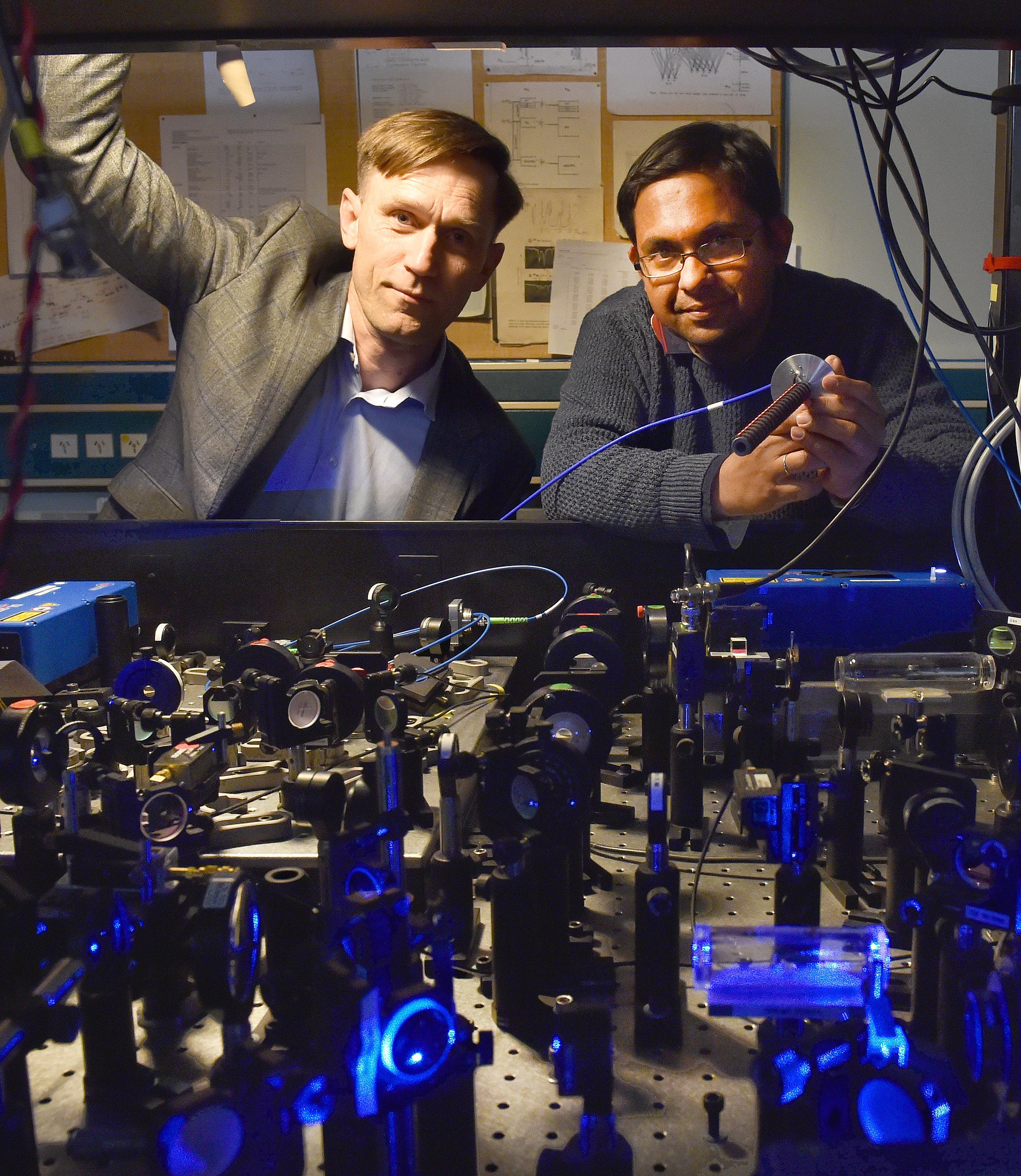 Physicists (from left) Prof Niels Kjaergaard and Dr Amita Deb,  holding a radio 
...