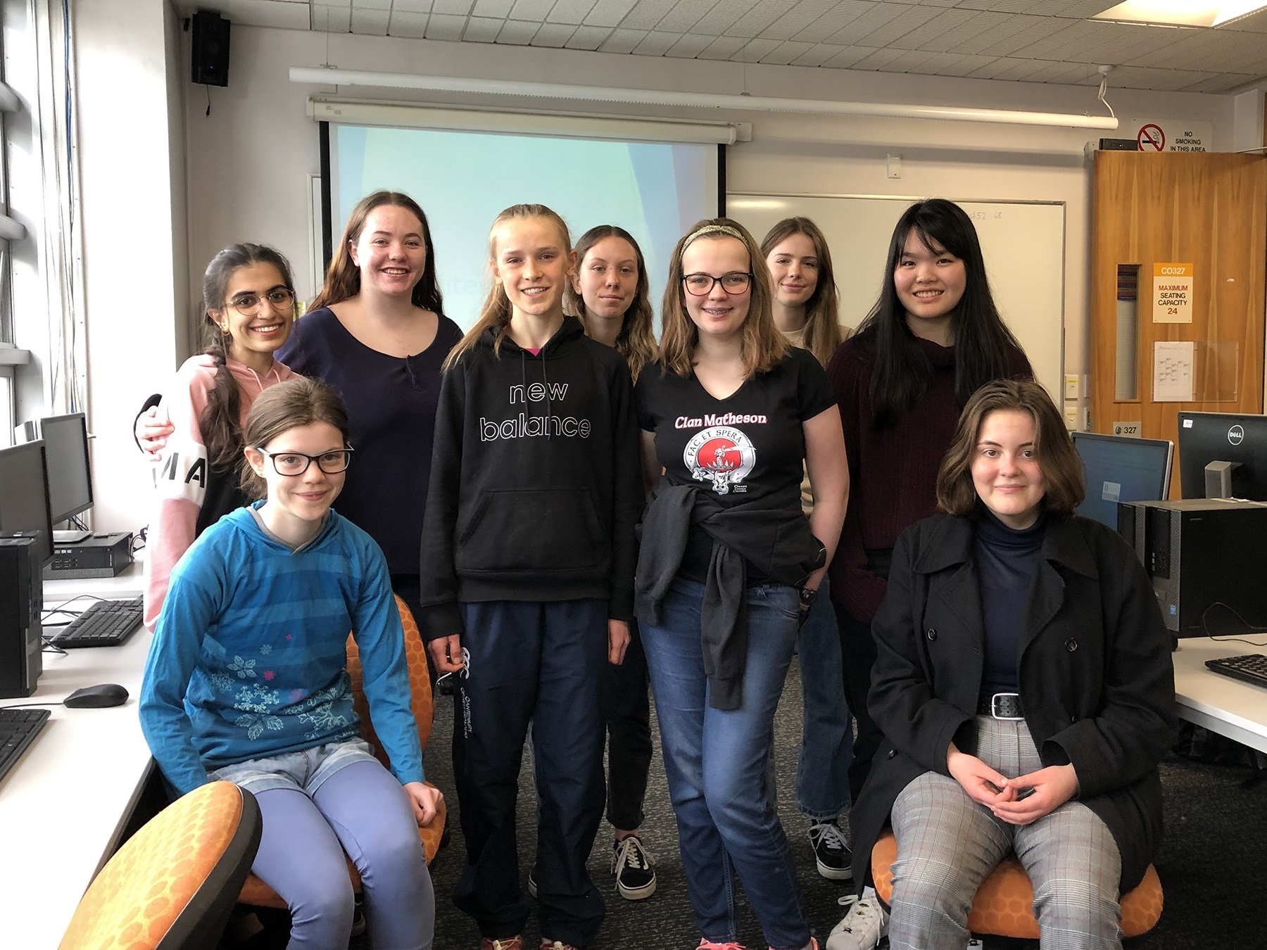 Gathered for the Programming Contest for Girls event this week are (standing, from left)...