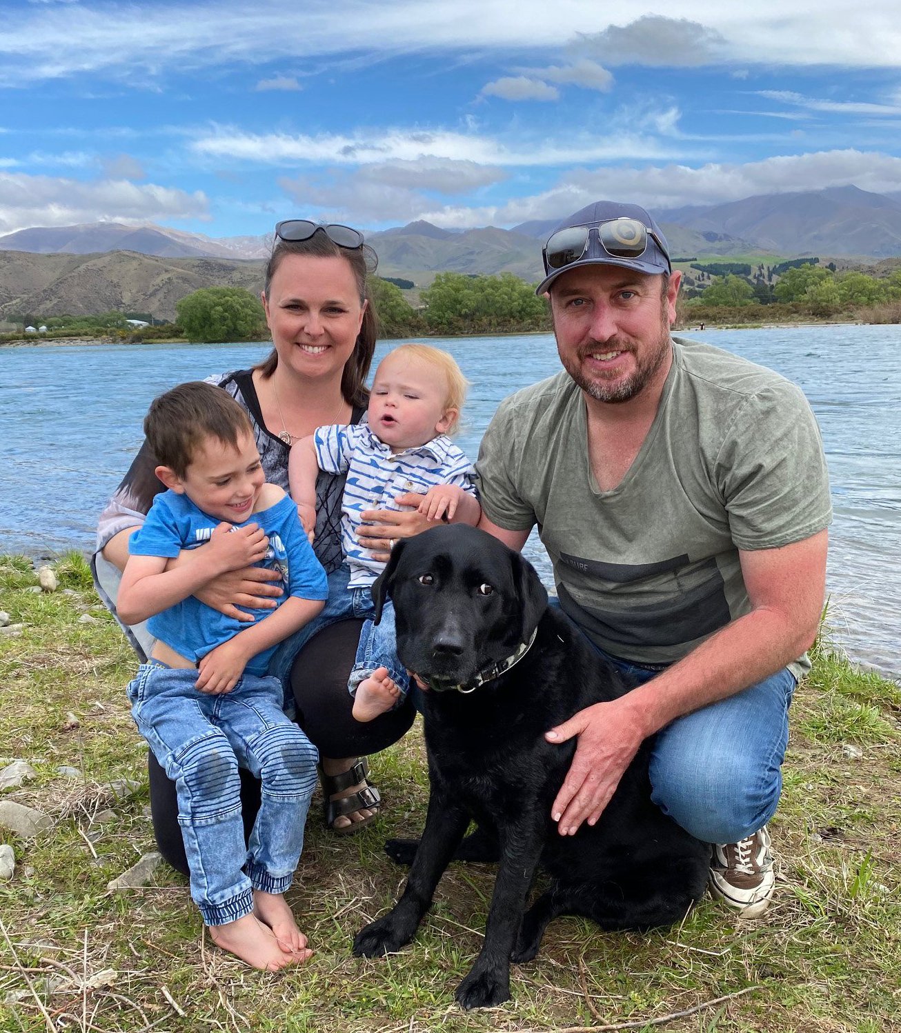 Nine-year-old black Labrador Roxy enjoys some fuss from her family after going missing for 24...