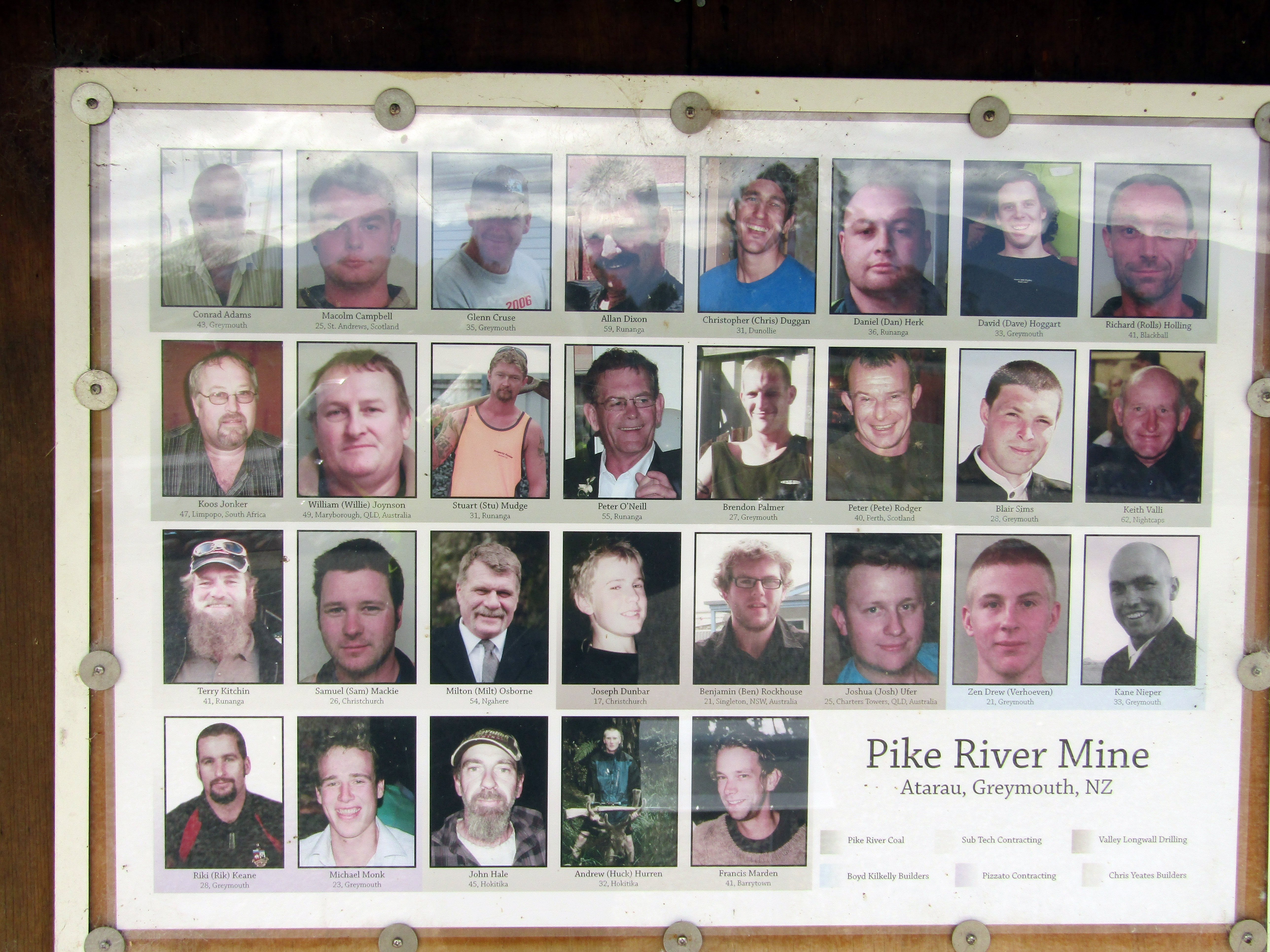 A photo of the miners’ portraits at the Pike River memorial gardens at Atarau. PHOTO: HELEN MURDOCH