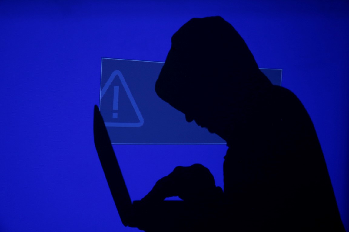 Cyber extortionists tricked victims into opening malicious malware attachments. Photo Reuters 