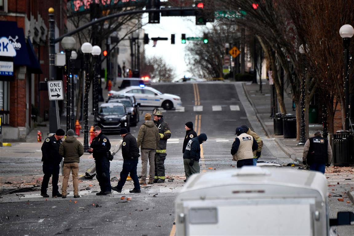 Debris litters the road near the site of an explosion in the area of Second and Commerce in...