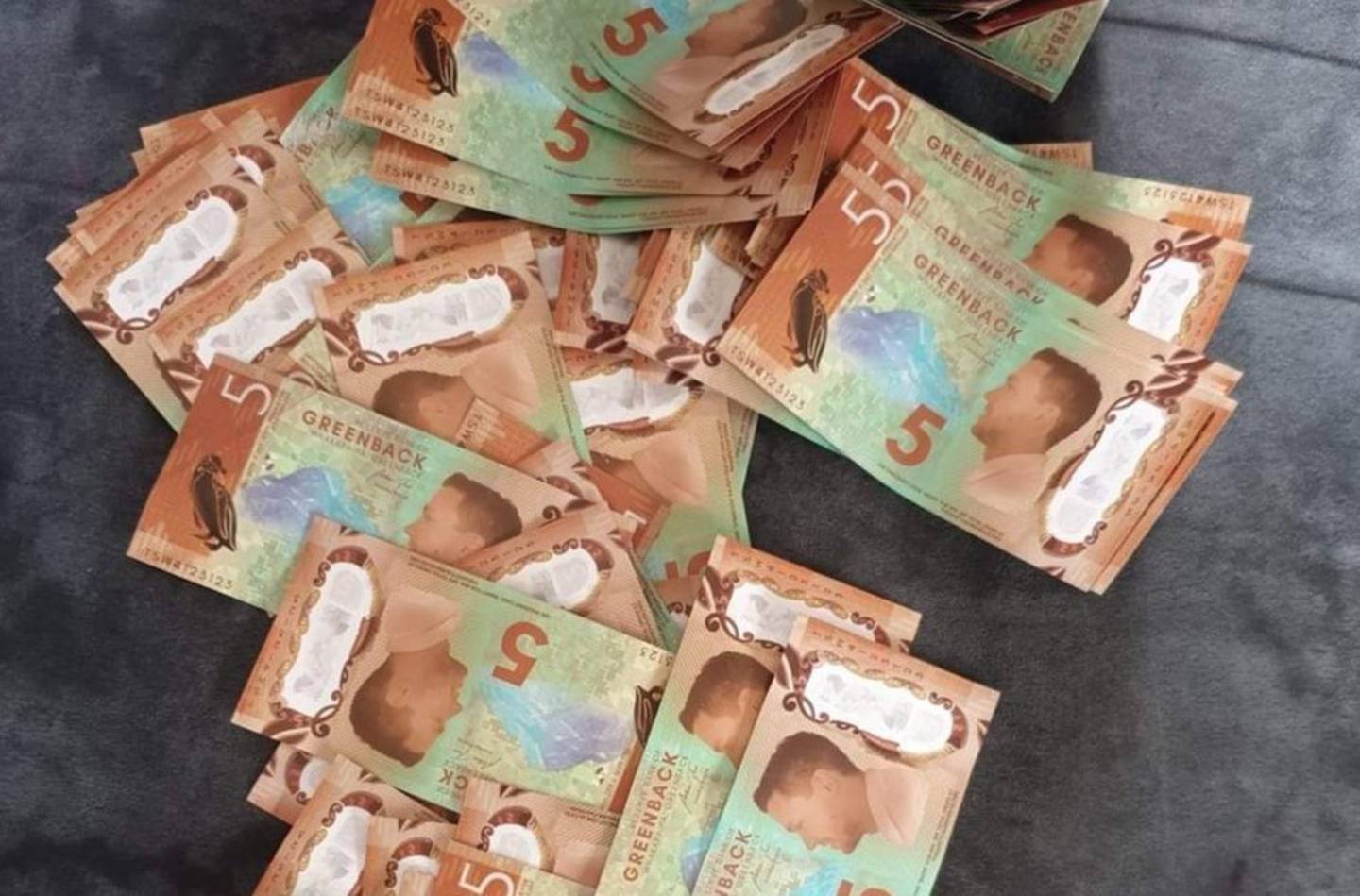 Crowds were dismayed to discover lookalike vouchers for the online store, instead of cash. Photo:...