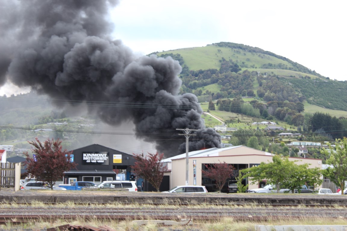 Smoke rises from the fire in Mosgiel this afternoon. Photo: Merv Chave