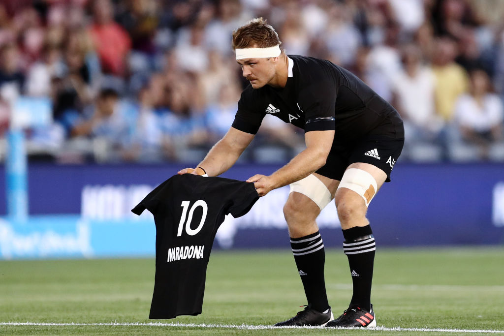 All Blacks skipper Sam Cane lays down a number 10 jersey as a tribute to Diego Maradona before...