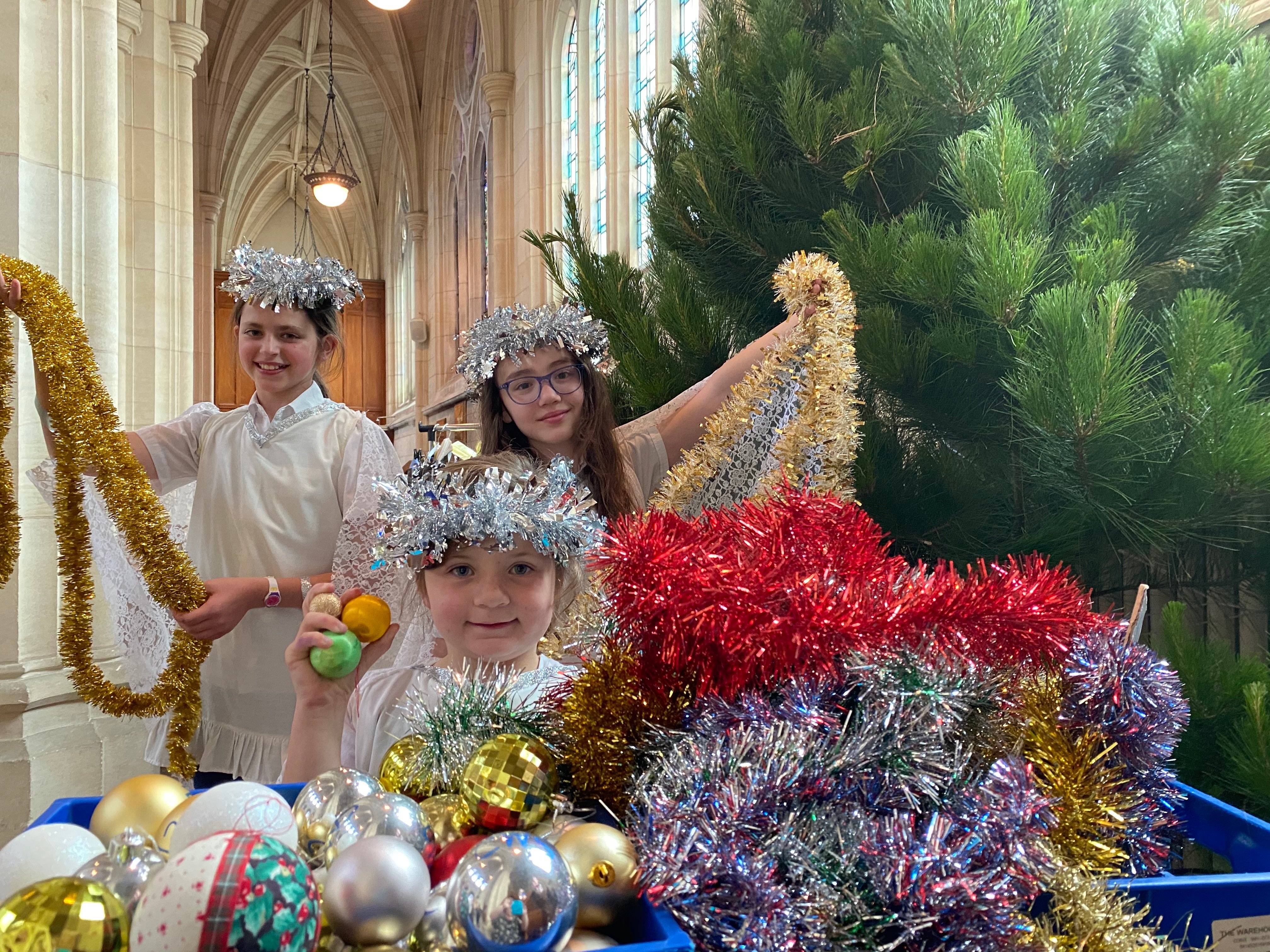 Christmas angels (from left) Theodora Clarke-Wallace (11), Charlotte Tallon-McCarthy (6), and...