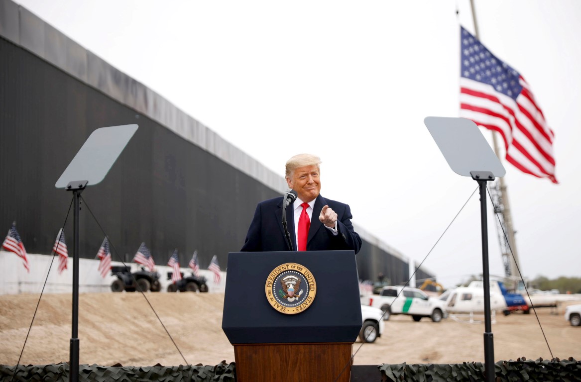 US President Donald Trump speaks during a visit at the US-Mexico border wall, in Alamo, Texas....