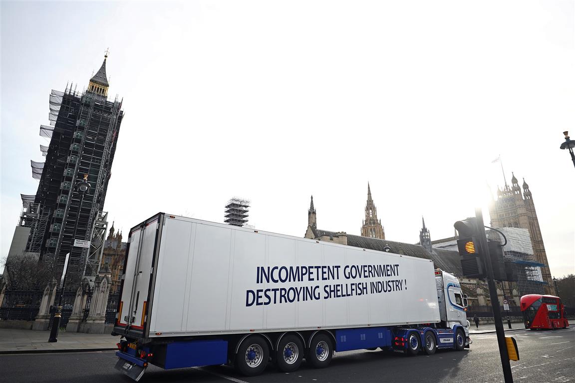 A truck takes part in a Brexit protest at Parliament Square in London. Photo: Reuters