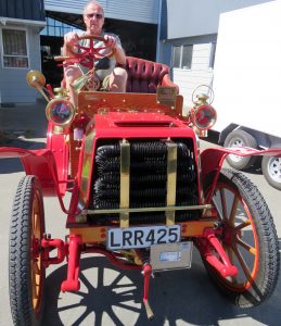 Gavin Hunt behind the wheel of the impressive 1903 Darracq at his workshop. Photo: Supplied