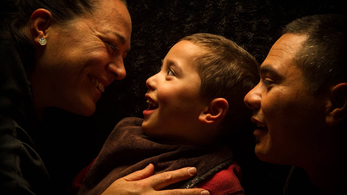 Marama Renata (left) and husband Wi Renata with their son Neihana who was severely brain damaged...