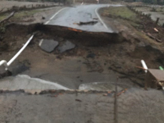 The rain caused significant damage in the approach to Patearoa Bridge yesterday. Photo: Central...