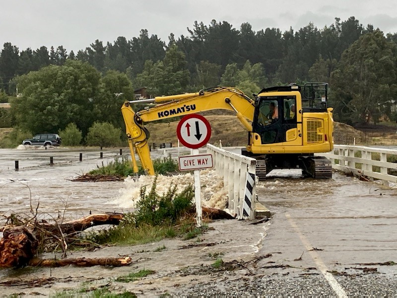 Patearoa township bridge was being cleared of debris this morning after flooding in the Maniototo...