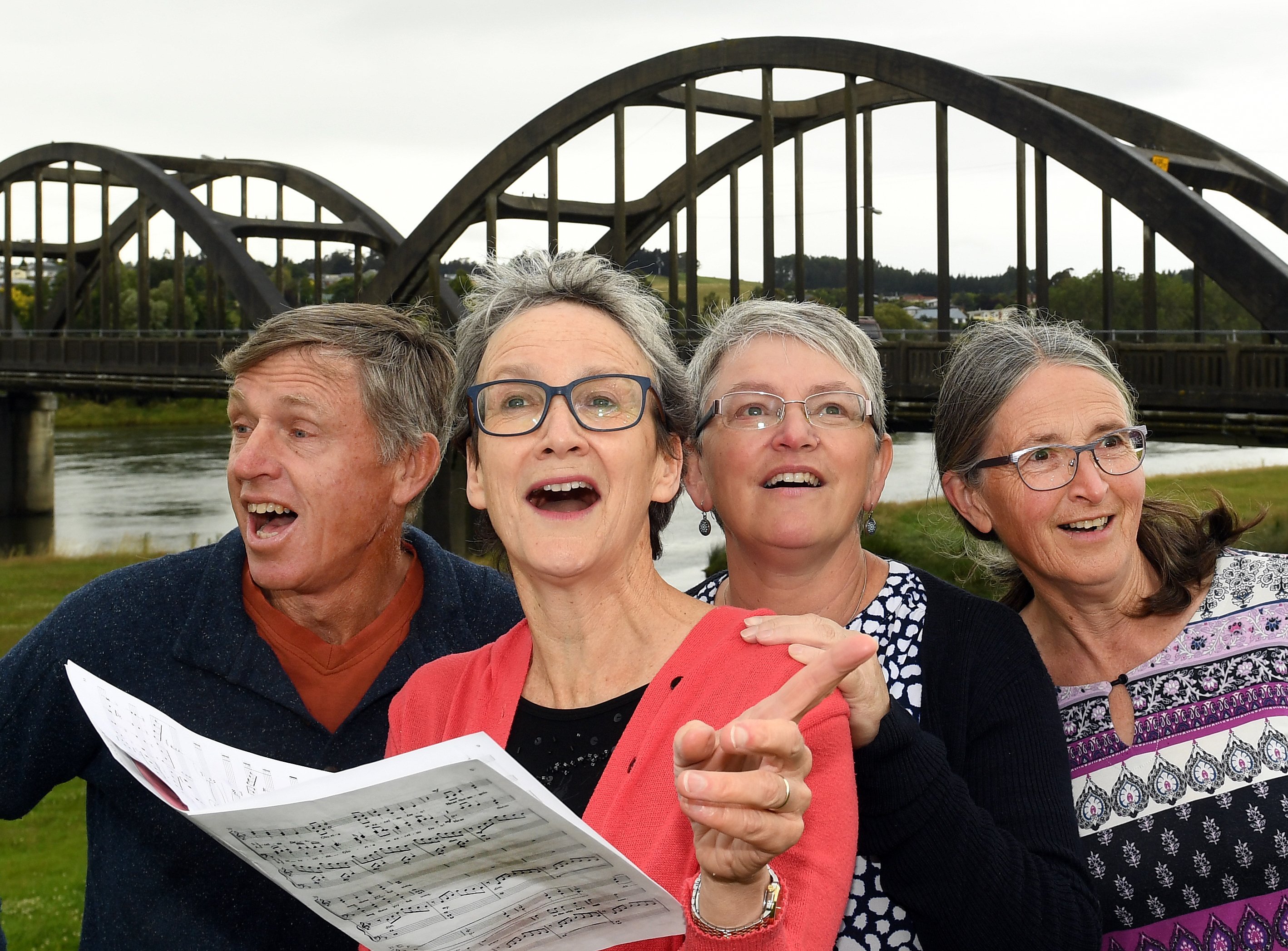 Phoenix Singers (from left) Neil Cullen, president Stephanie Bowden, Belinda Mason, and Suzanne...