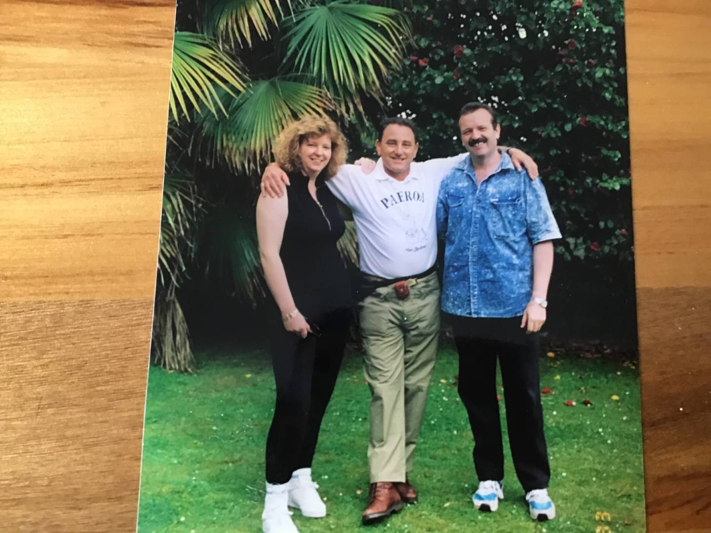 Janice Sodeau, and her husband Bill, flank brother Mike Dinnick. Photo: Supplied via NZH