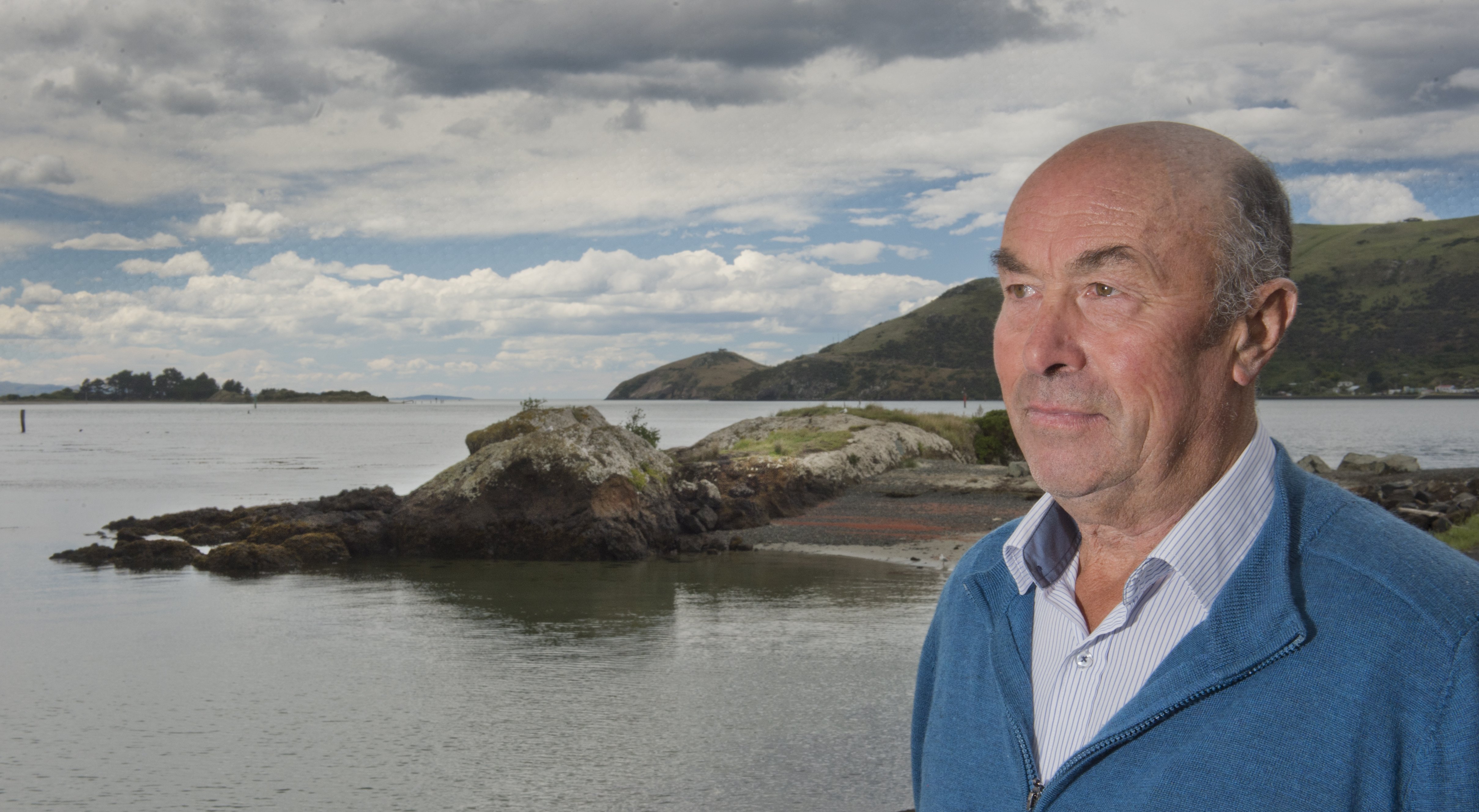 Otakou kaumatua Edward Ellison stands at Wellers Rock on the Otago Peninsula, which is named...