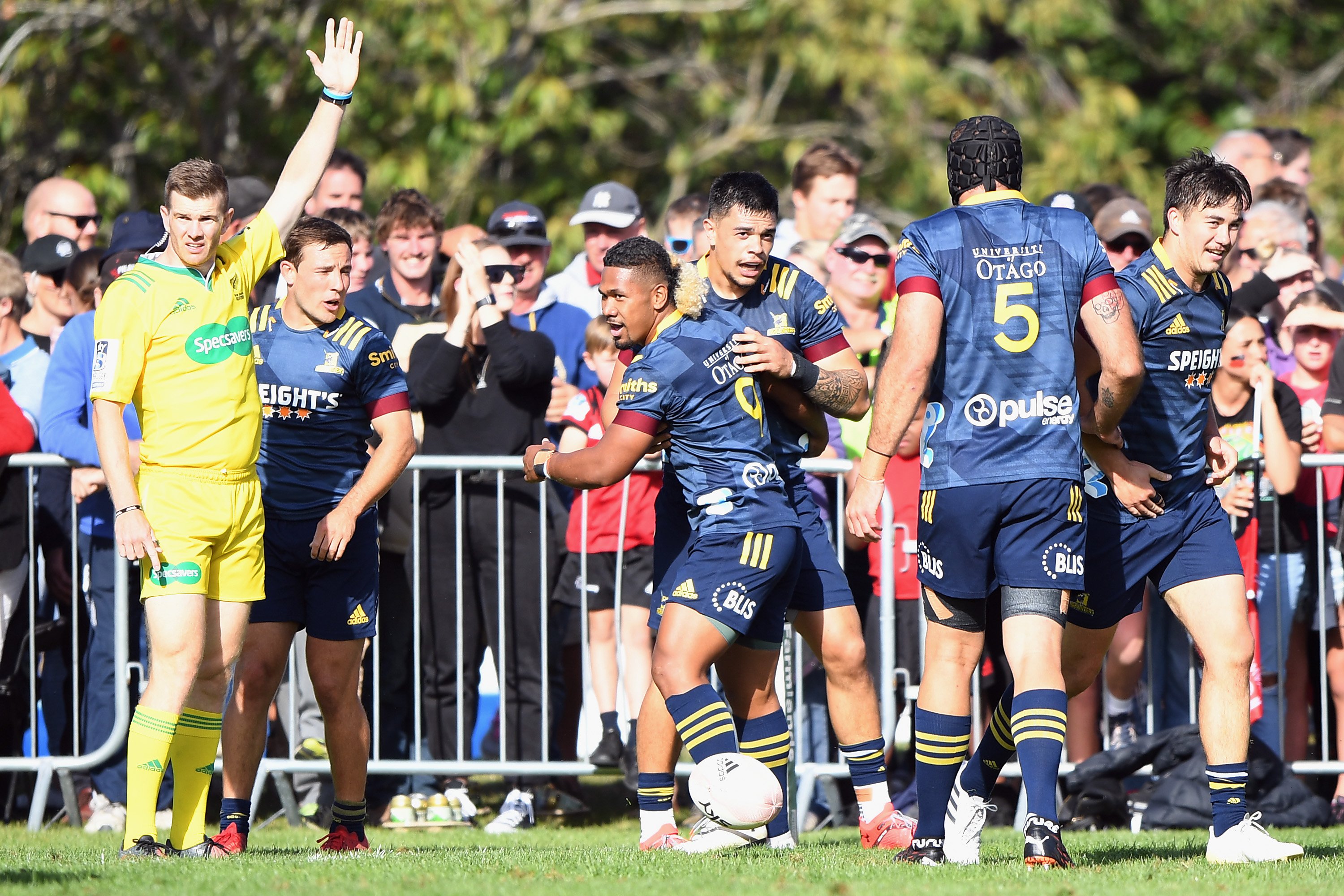 Highlanders halfback Folau Fakatava congratulates Ngane Punivai on scoring a try in Temuka last...