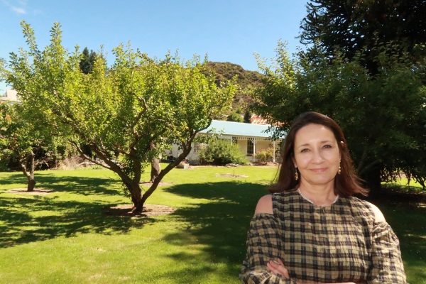 Nadine Conway on the Reidhaven property. Photo: Mountain Scene