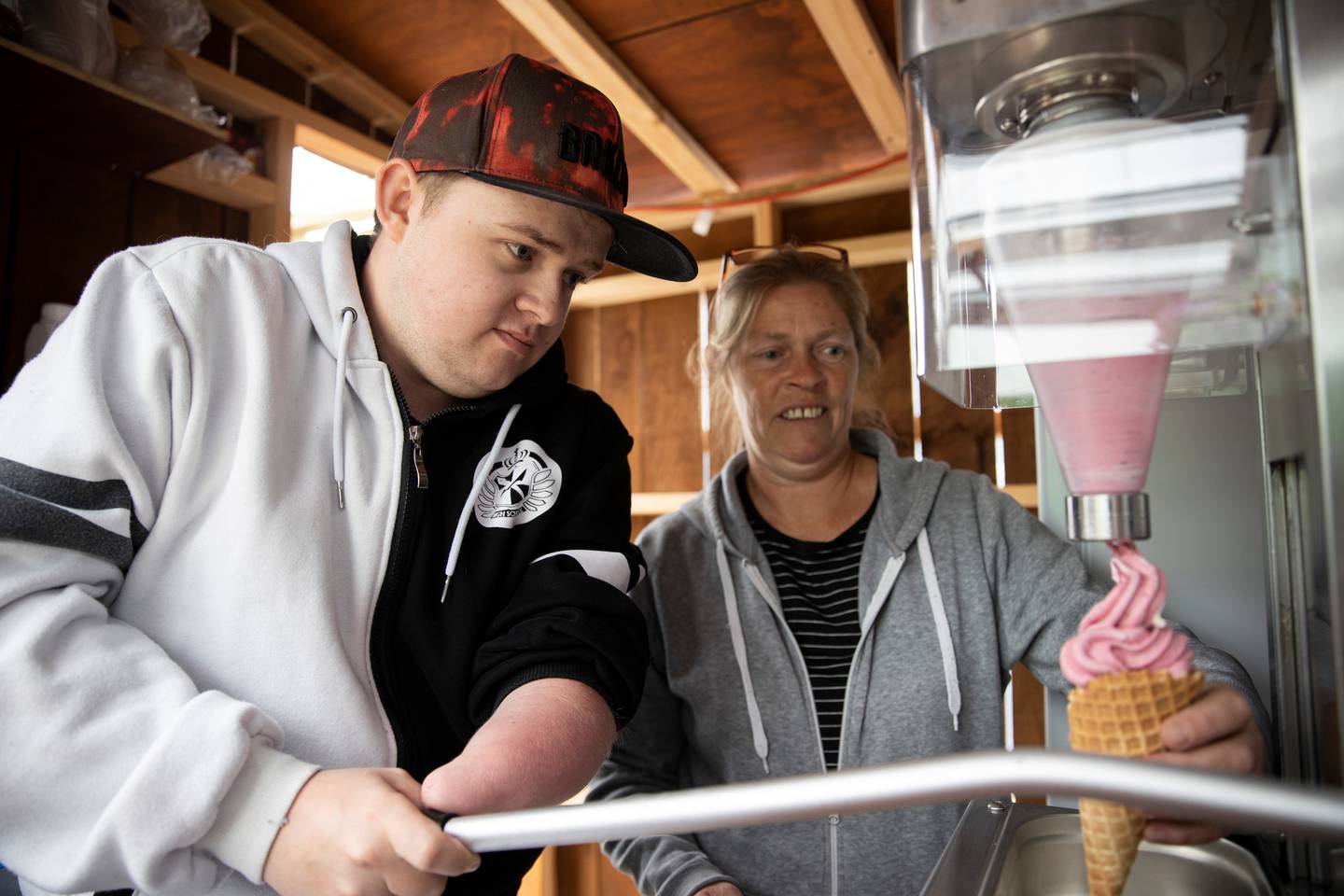 Jake loves making real-fruit ice-creams with his mum Deborah at their Mayfield family cafe. Photo...