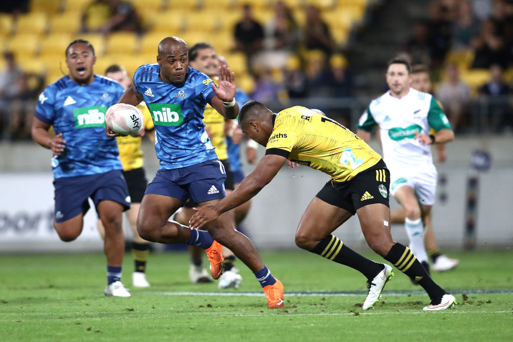 The Blues' Mark Telea makes a break against the Hurricanes. Photo: Getty Images