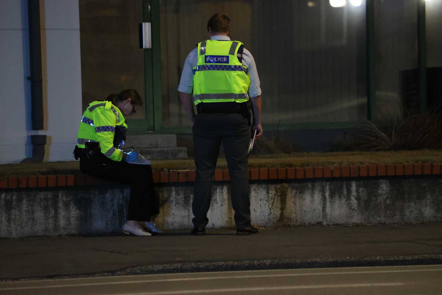 Police officers at the scene in Christchurch last night. Photo: George Heard