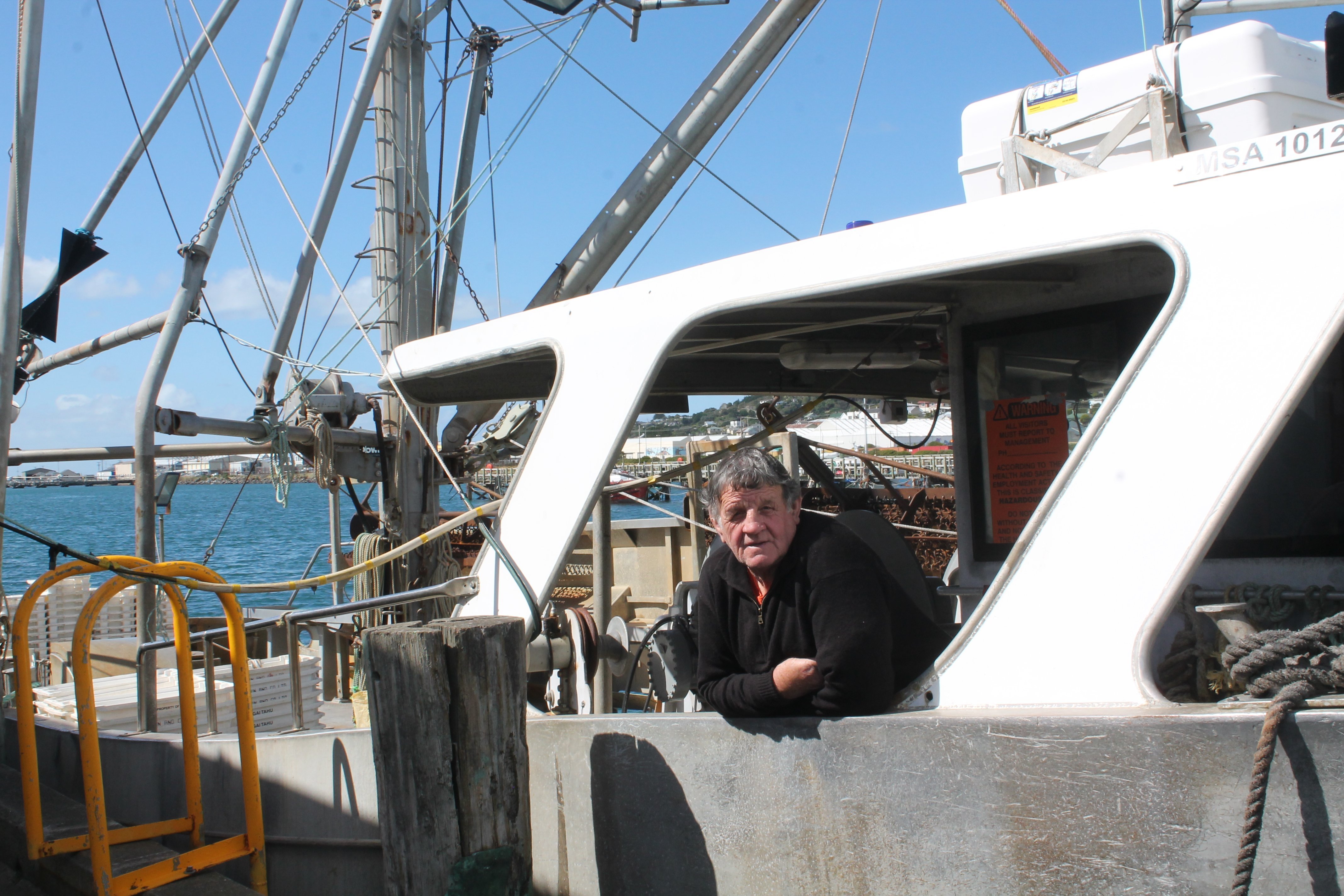 Oysterman John Edminstin prepares his fishing boat Polaris for the beginning of oyster season...