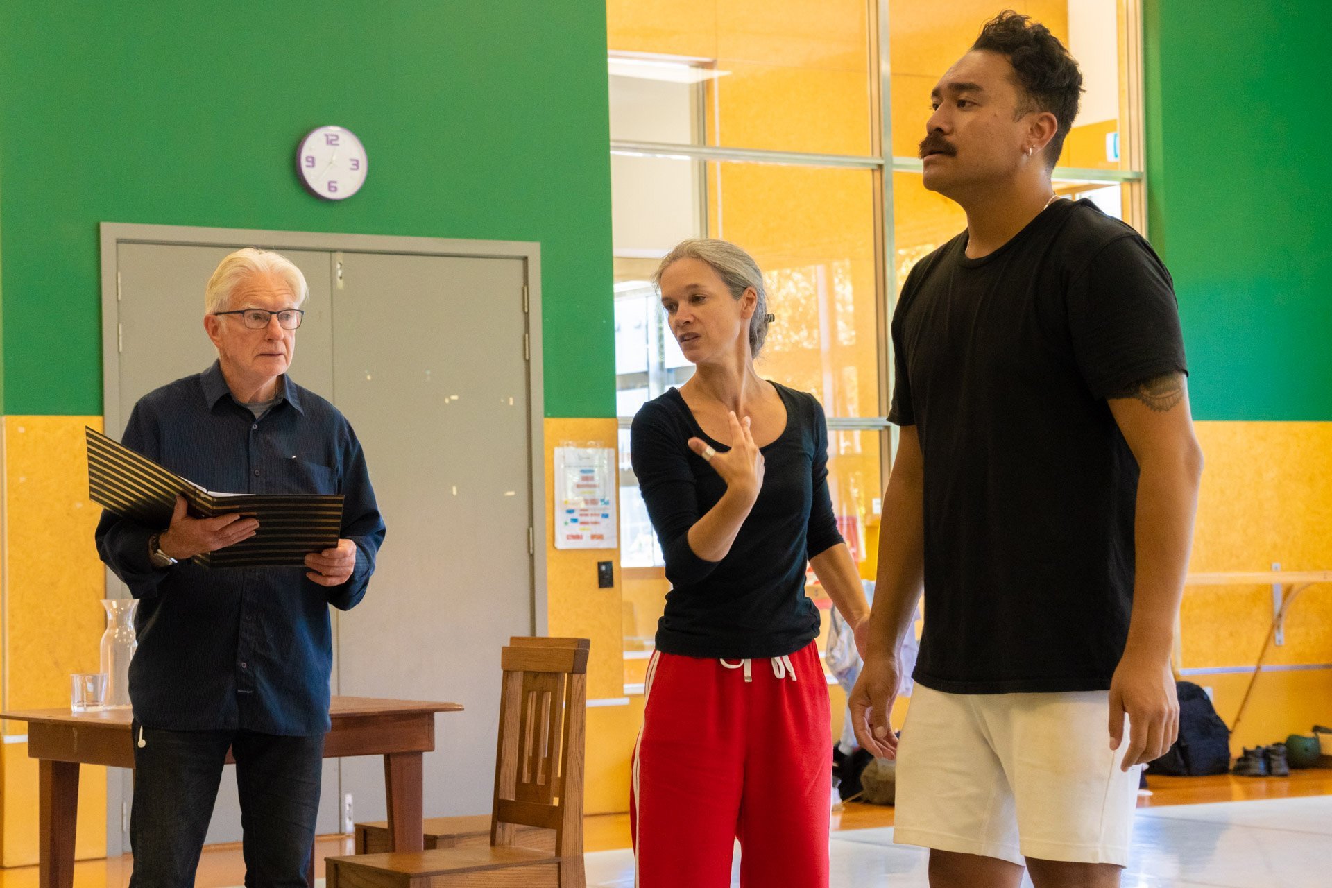 Rehearsing for The Soldier’s Tale are (from left) narrator Peter Hayden, director Sara Brodie and...