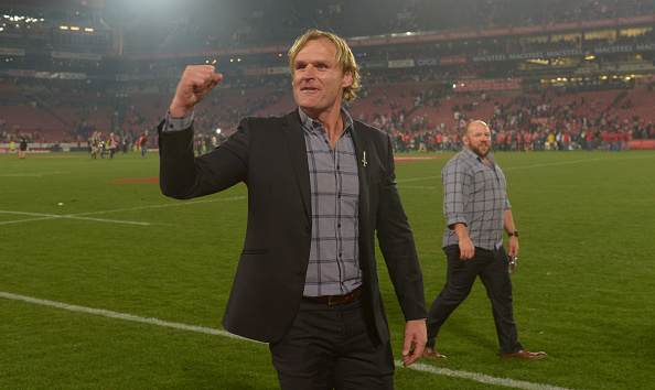 Scott Robertson celebrates after the Super Rugby final between the Lions and Crusaders at...