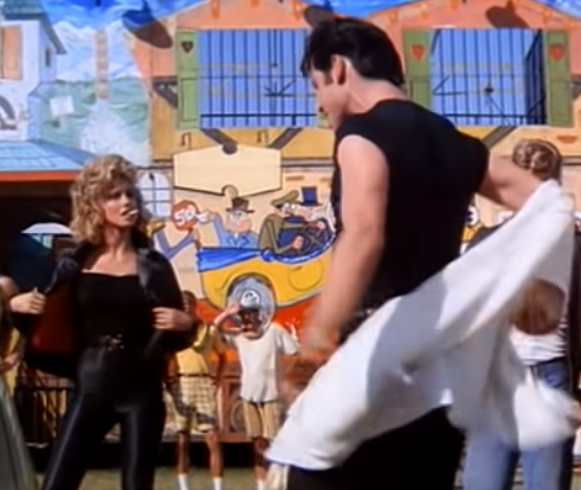 Olivia Newton John as the transformed Sandy in Grease with John Travolta. Photo: YouTube 