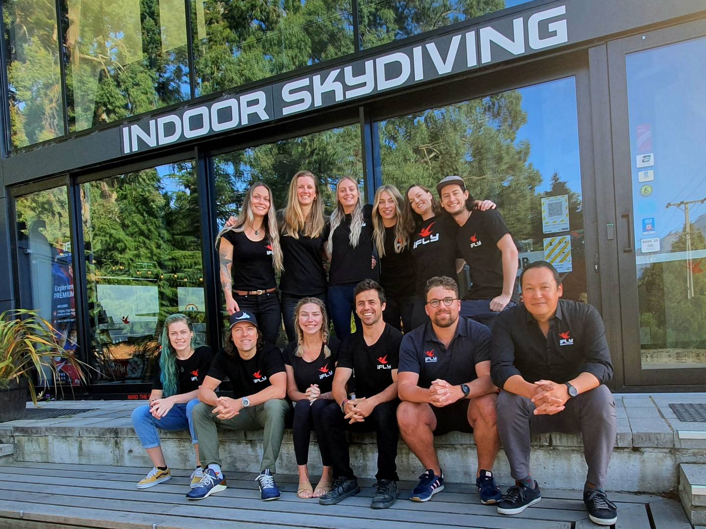 Matt Wong, right, with the Brecon Street iFly team in Queenstown. Photo: Supplied