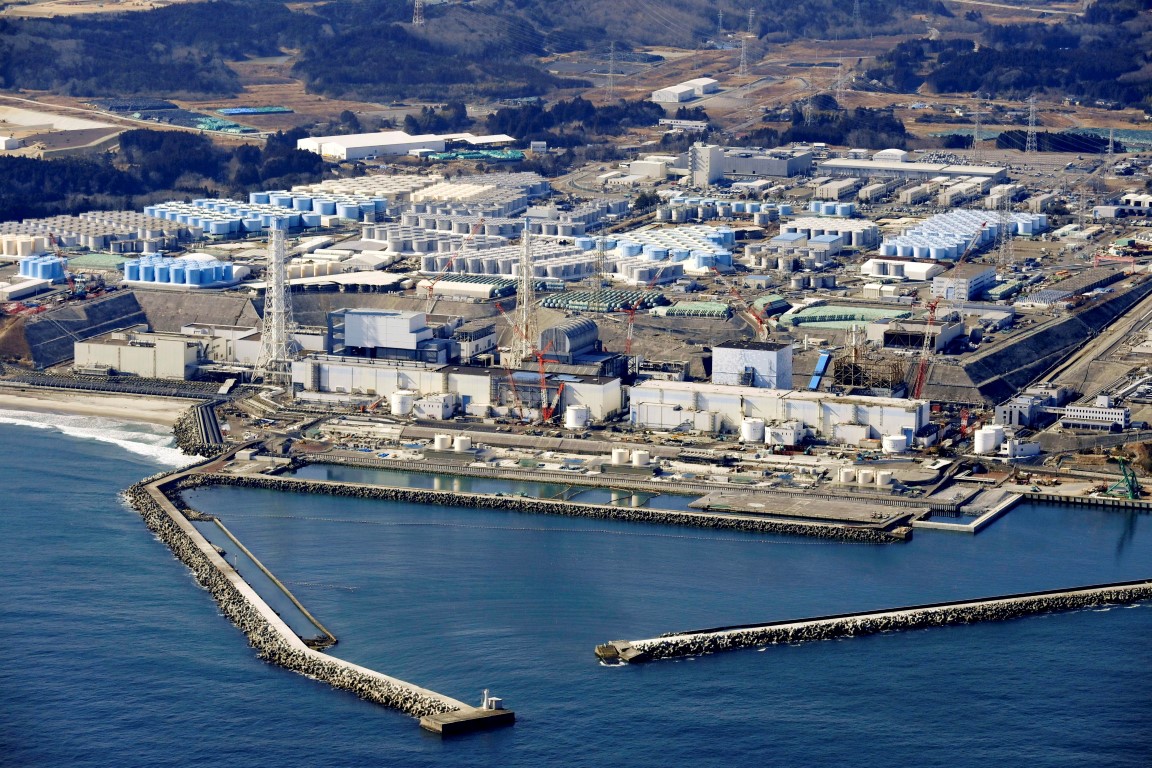 An aerial photograph taken in February shows the storage tanks for treated water at the tsunami...