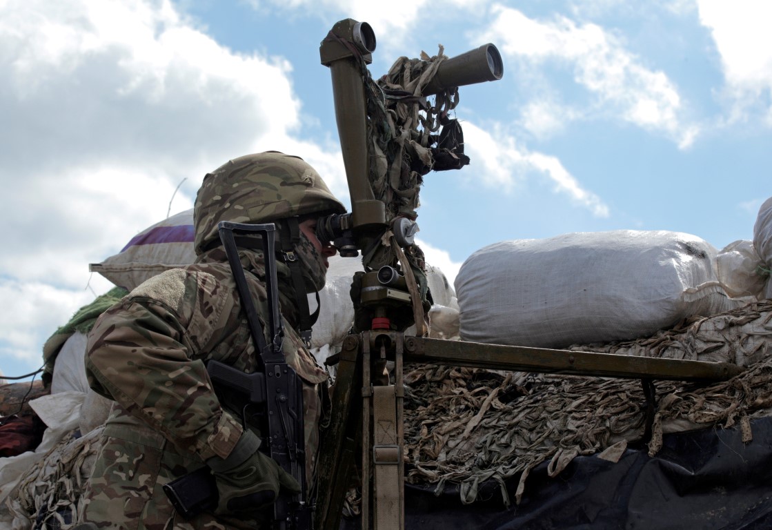 A Ukrainian armed forces member at the line of separation near the rebel-controlled city of...