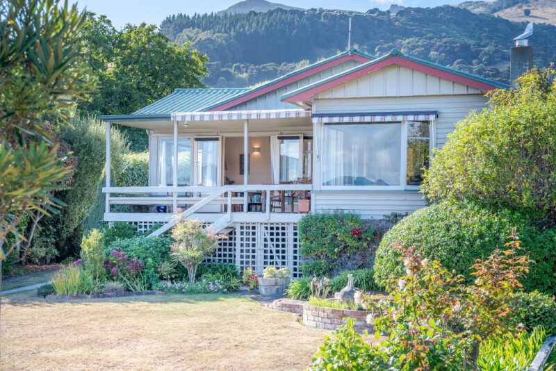 The 1950s bungalow sits on a 981 sq m section by the ocean. Photo: Supplied