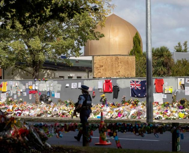 Flowers at the gate of the Al Noor Mosque in Christchurch. Photo: NZME