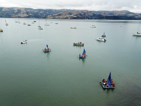 Akaroa school students cross the harbour in homemade rafts as part of the school's yearly Frank...