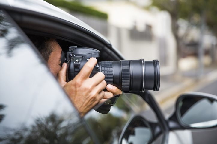 A generic image of a private investigator in a car. Photo: Getty