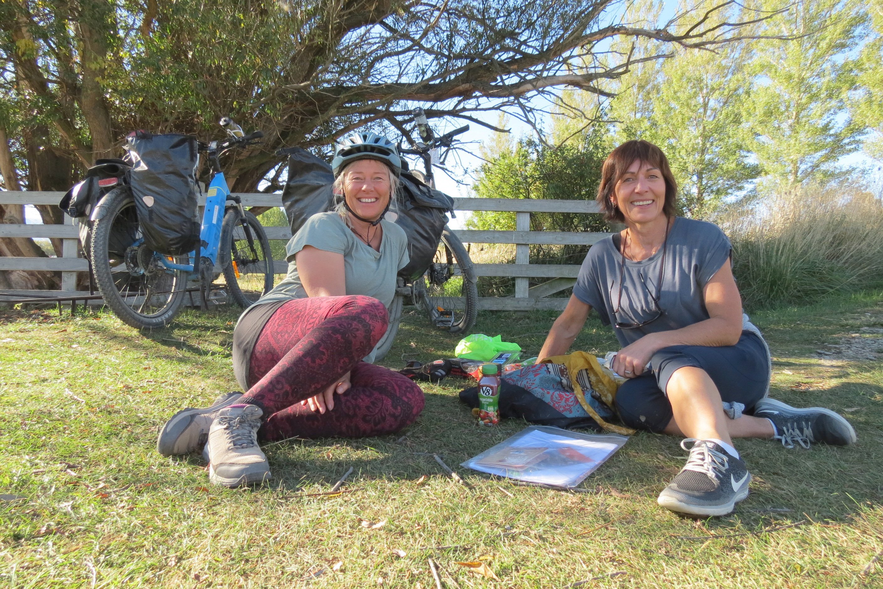 Making the most of the sunshine alongside the Otago Central Rail Trail at Chatto Creek are...