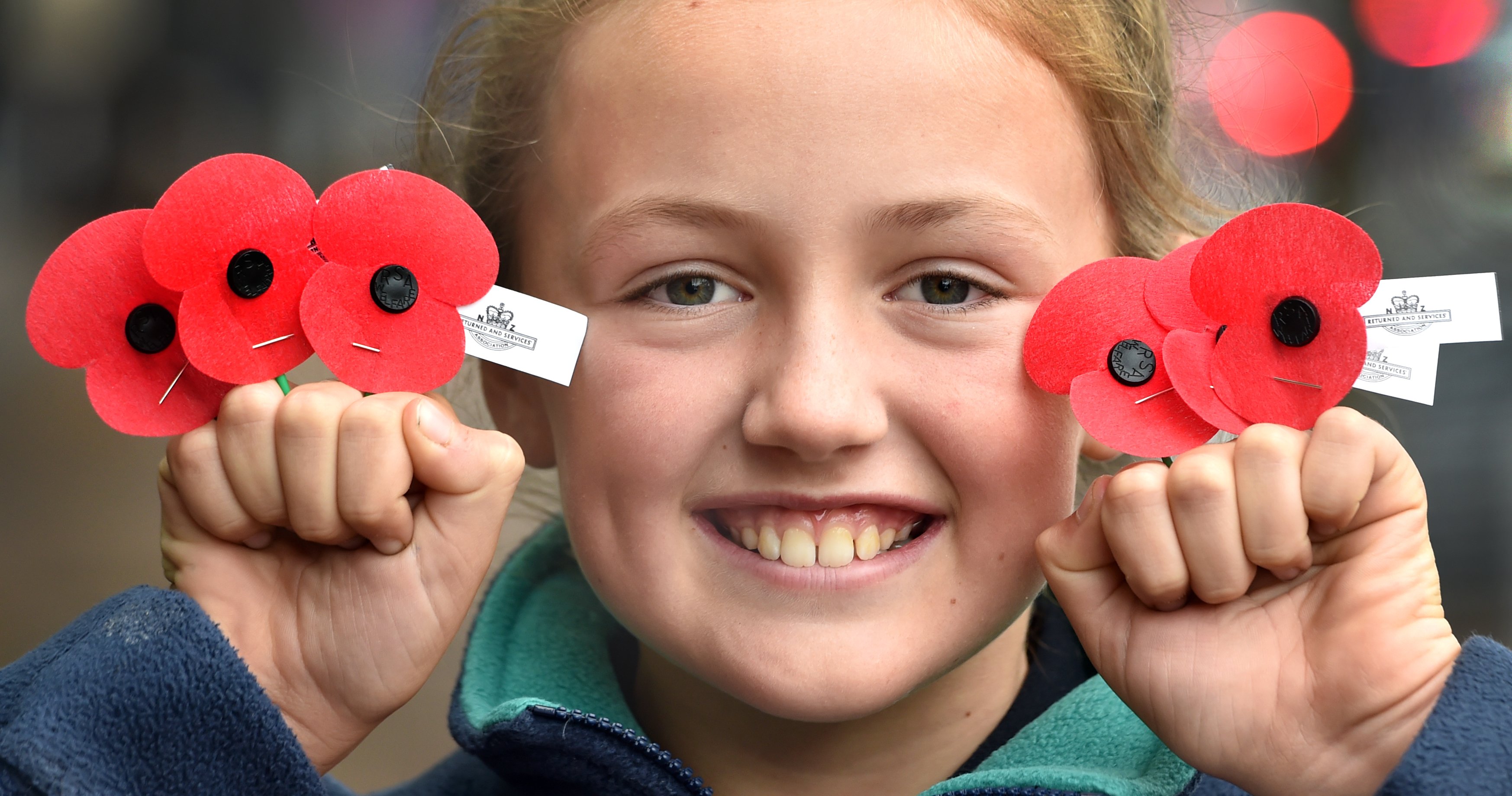 Smiling with her poppies outside the Golden Centre is Grace Slocombe (10) of Dunedin. PHOTO:...