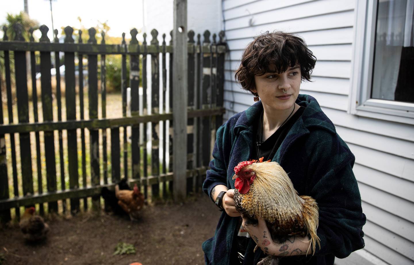 Oliva Cook has a special bond to her pet rooster Babs. Photo: George Heard