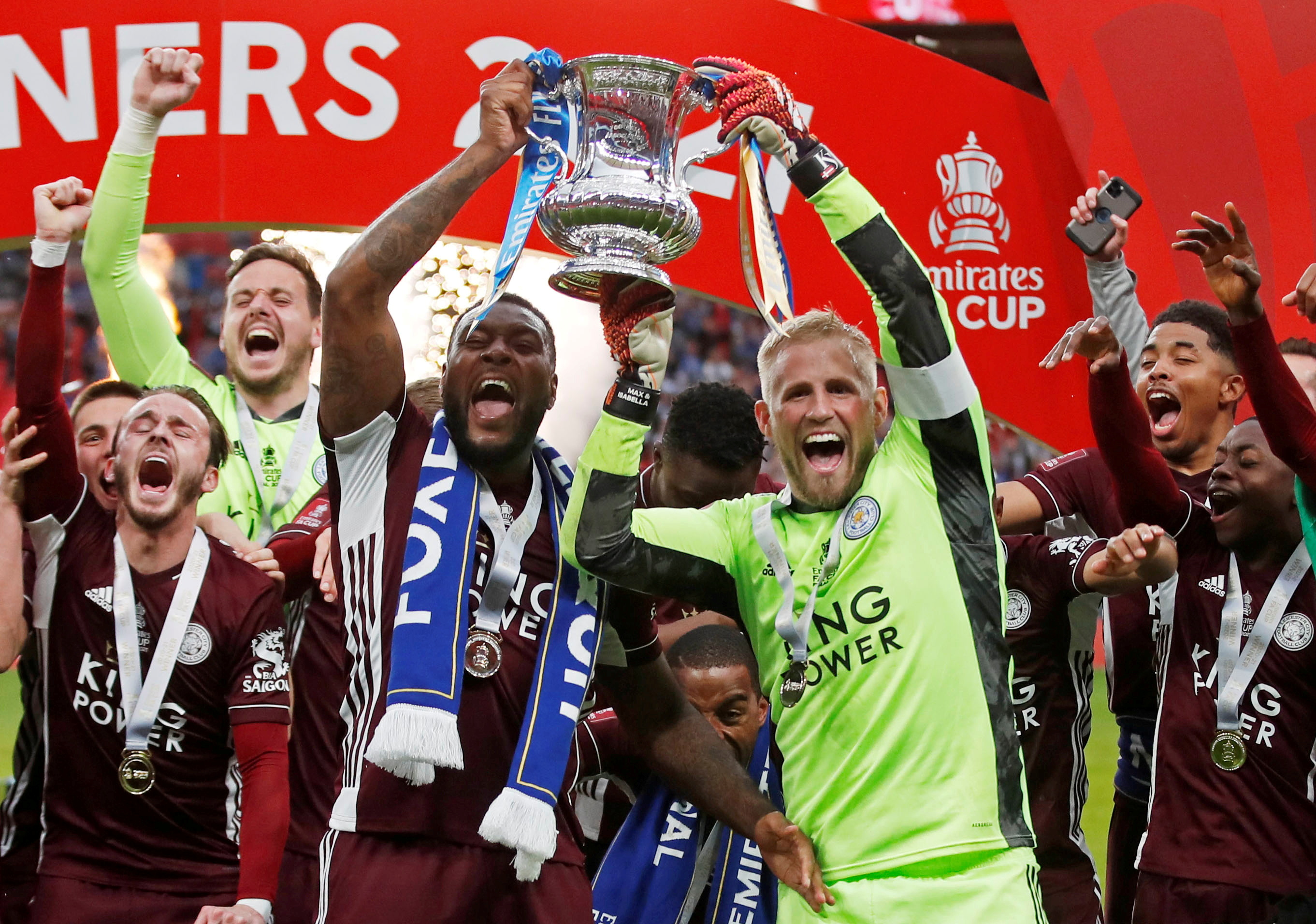 Leicester City's Wes Morgan and Kasper Schmeichel celebrate winning the FA Cup. Photo: Reuters 