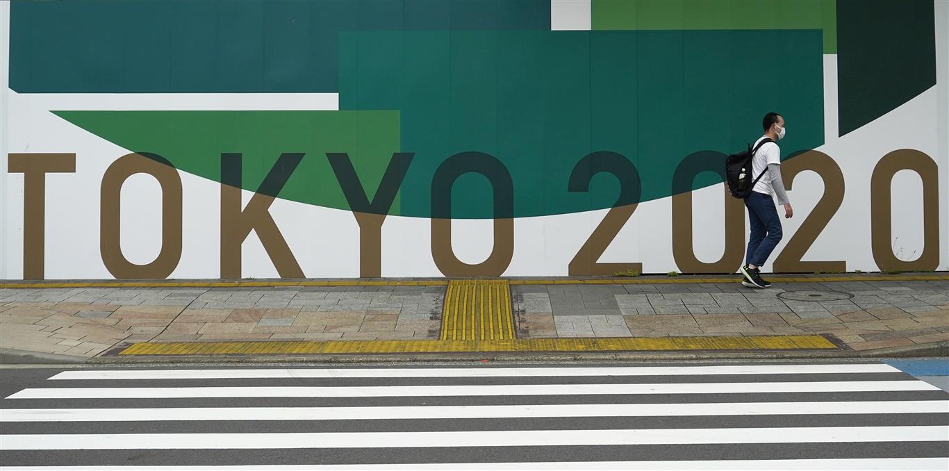 A sign advertising the 2020 Olympic Games, which have been postponed to 2021 due to coronavirus,...