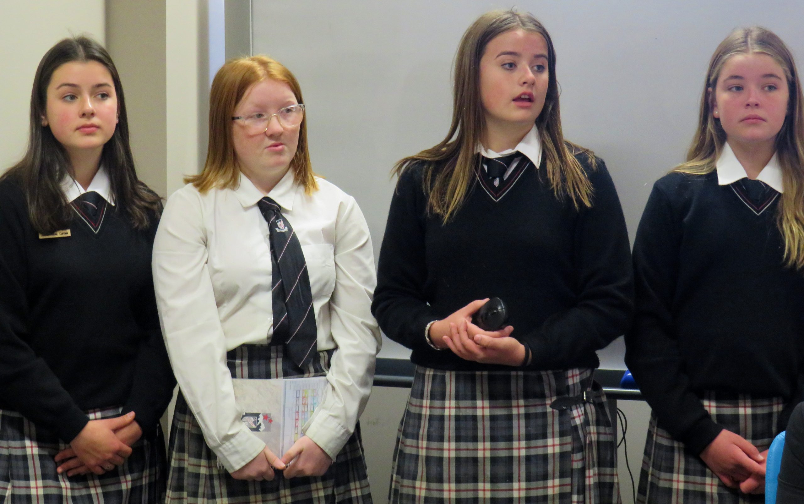 (From left) Maddie Webb, Estella Lister, Layla Manning and Sienna McGinity speaking at Monday's...